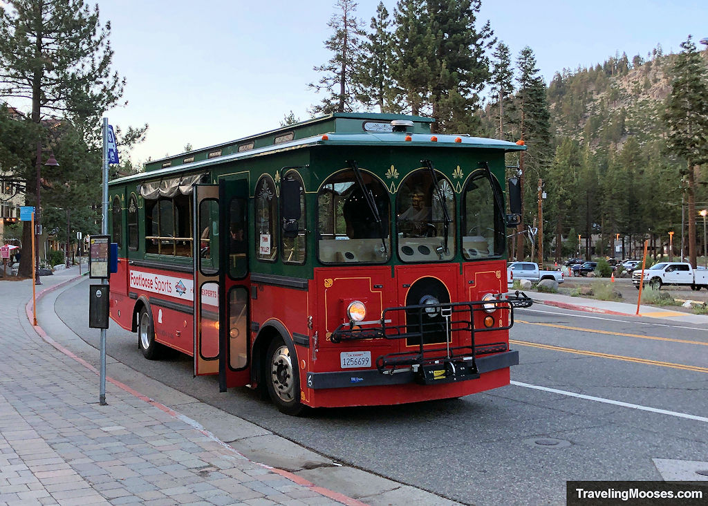 Red and green open air trolley car
