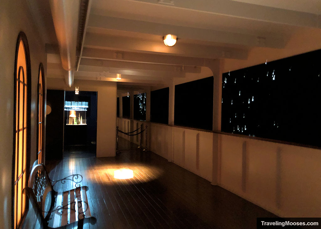 A recreated balcony area at night of the Titanic
