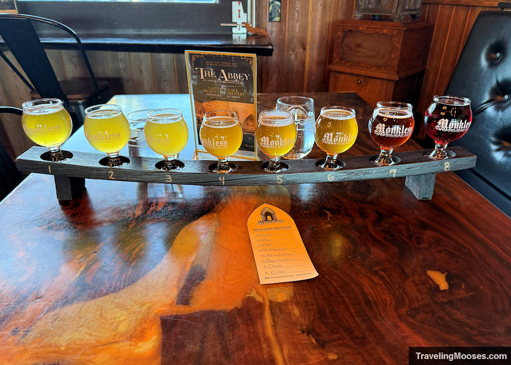 Flight of mini tasting glasses filled with beer