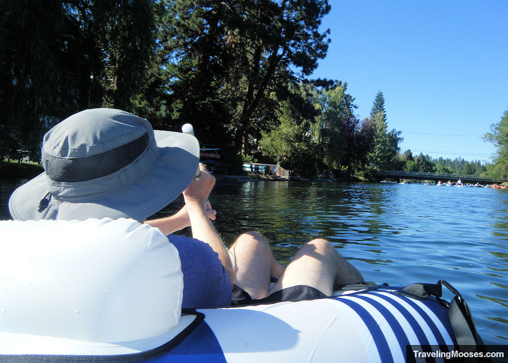 Man paddling down the river