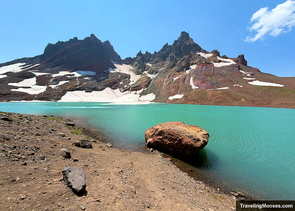 Aqua Blue Lake amongst jagged mountain peaks