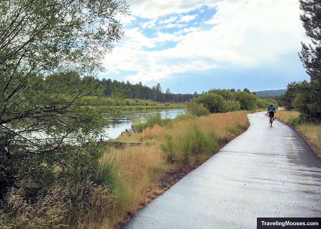 Biking path wnding by the river after a rain storm