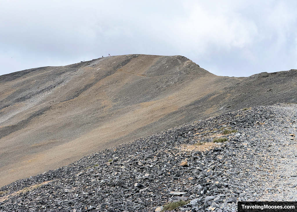 Trail winding up through scree to the Charleston Summit