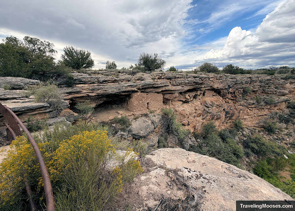 Prehistoric Sinagua stone masonry cliff dwelling built beneath an overhanging limestone ledge at Montezuma Well National Monument.