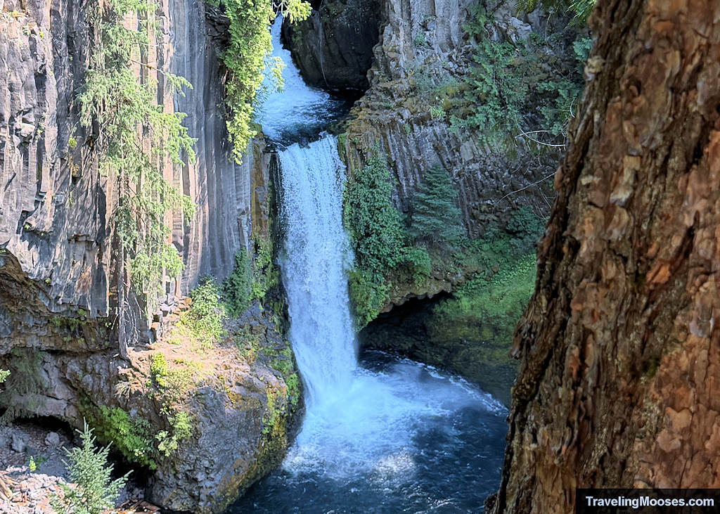 Waterfall cascading down a canyon