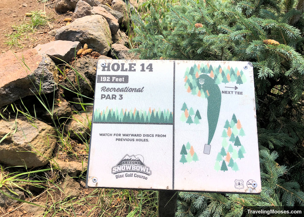 Hole number 14 sign at snowbowl disc golf course