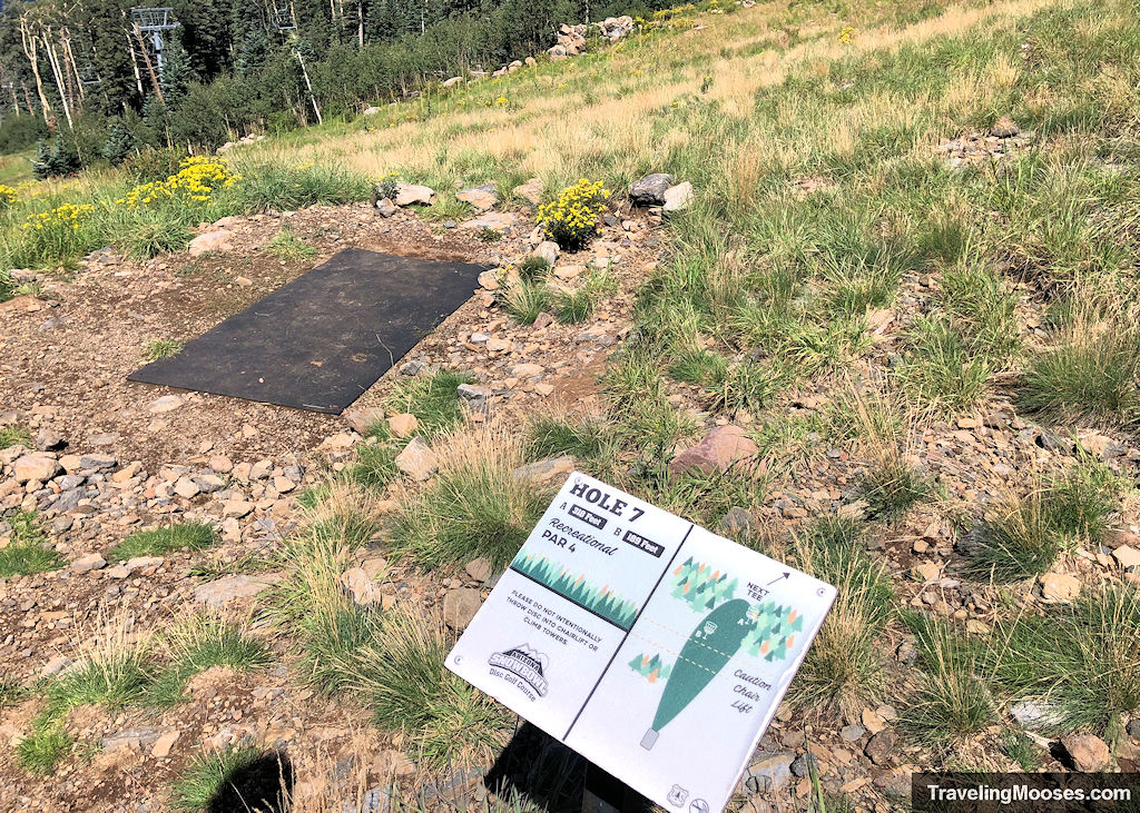 Tee box and signage for hole # 7 at snowbowl ski resort