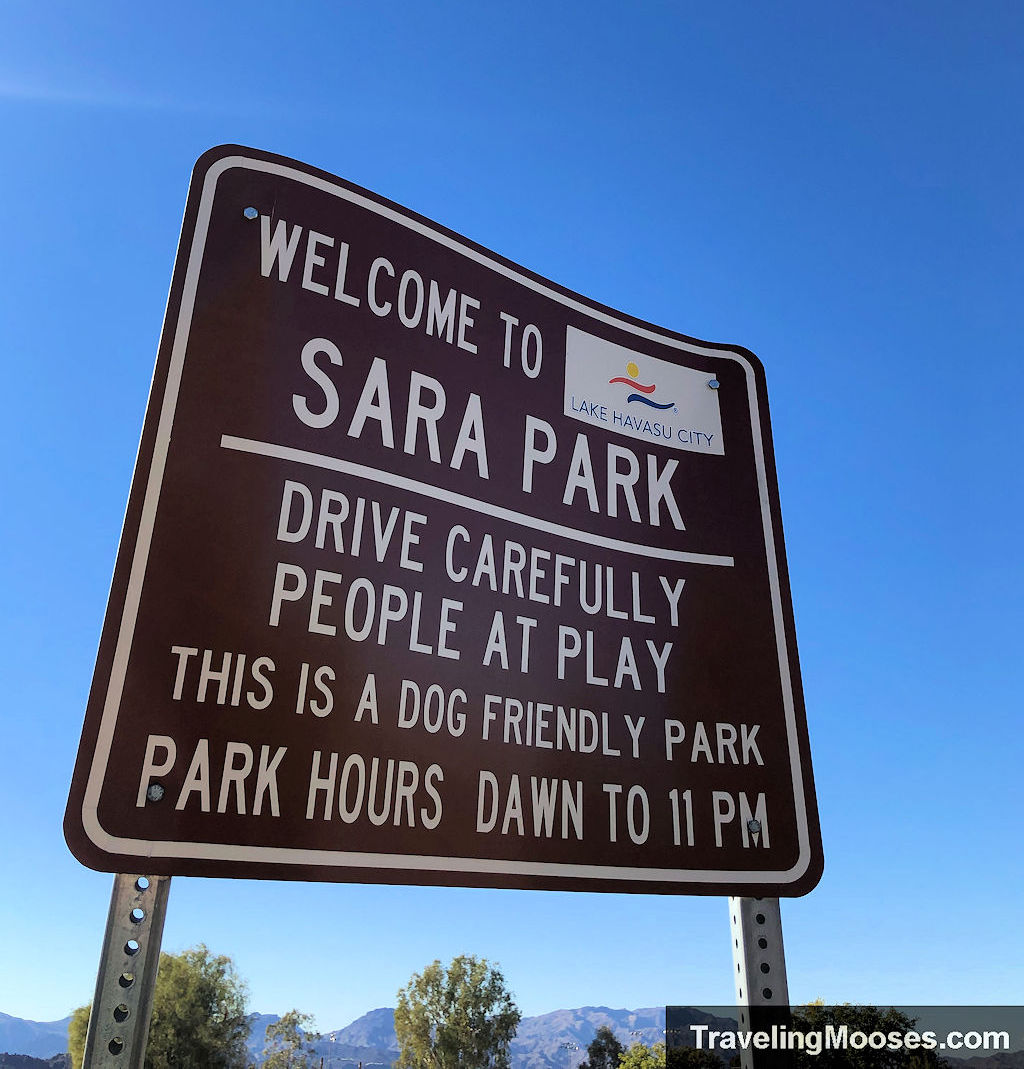 Welcome to Sara Park sign with white lettering on a brown background