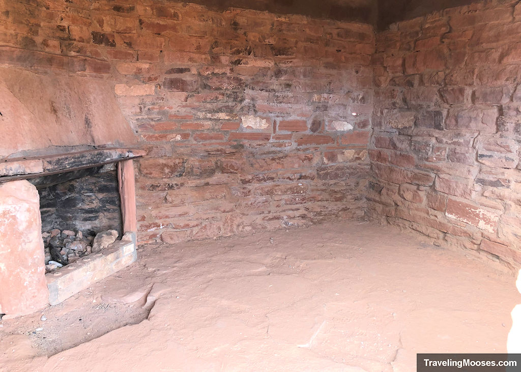 primitive stone structure with a fireplace