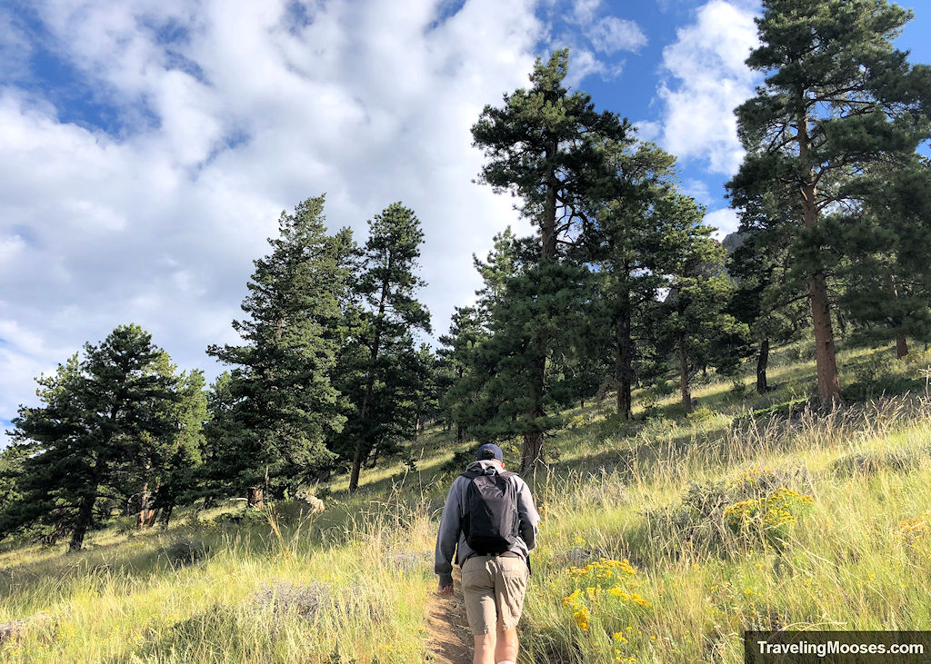 Man walking up Teddy's Teeth trail