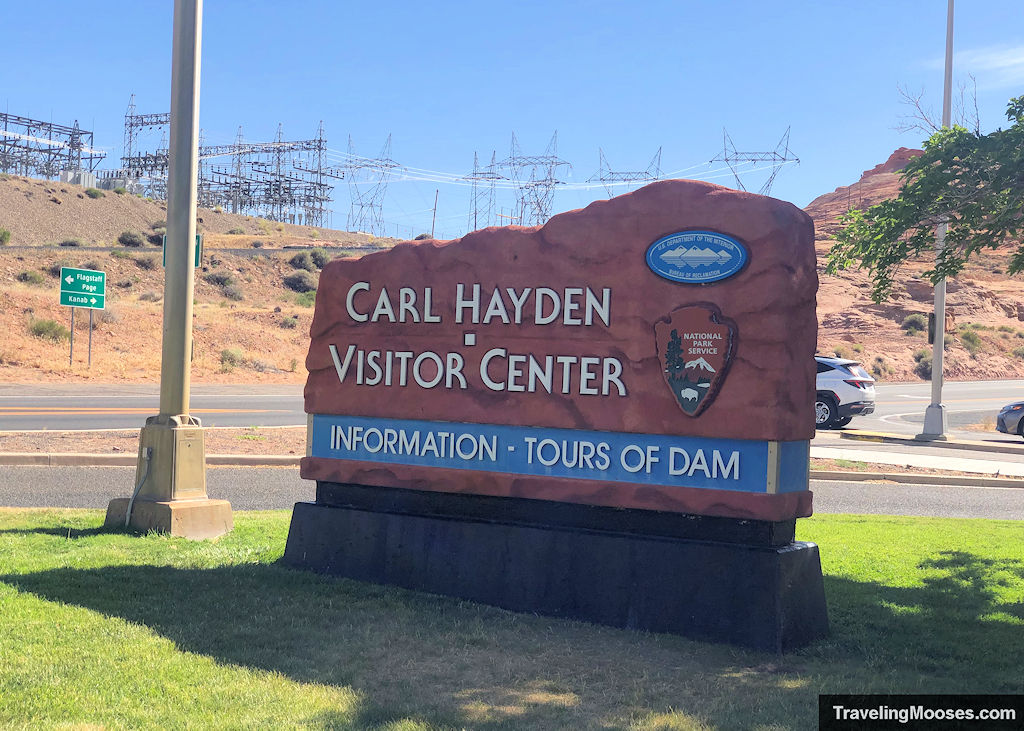 Carl Hayden Visitor Sign set on a large reddish stone