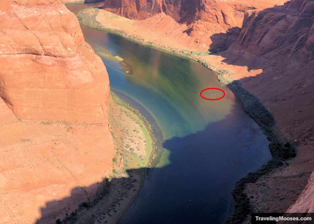 Kayakers barely seen 1,000 feet below the Horseshoe Bend overlook