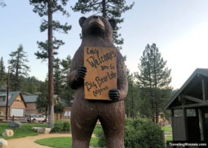 Bear statute holding a sign that says Welcome to Big Bear Lake California