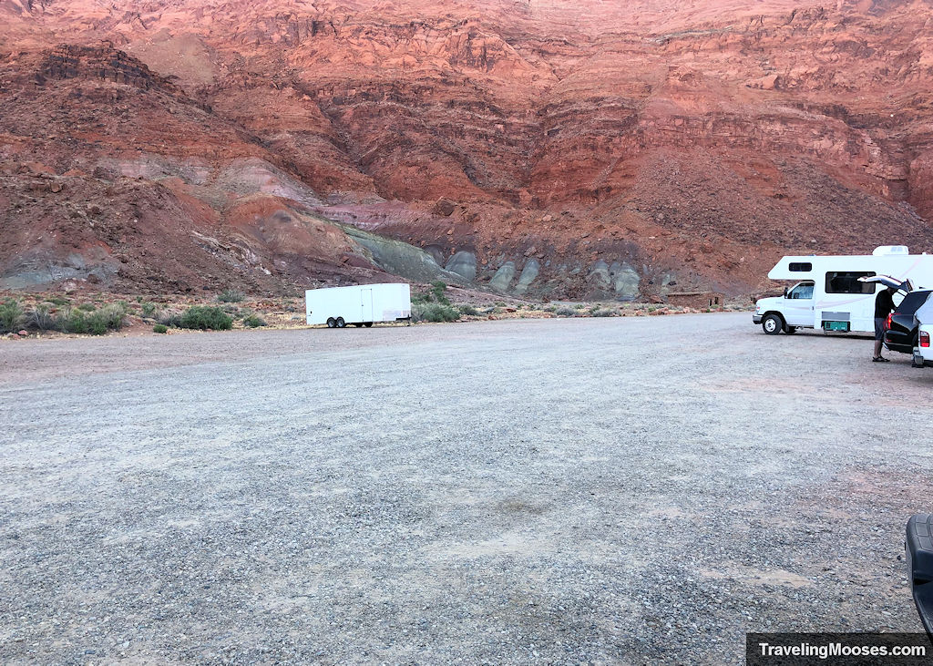 Mostly empty gravel parking lot