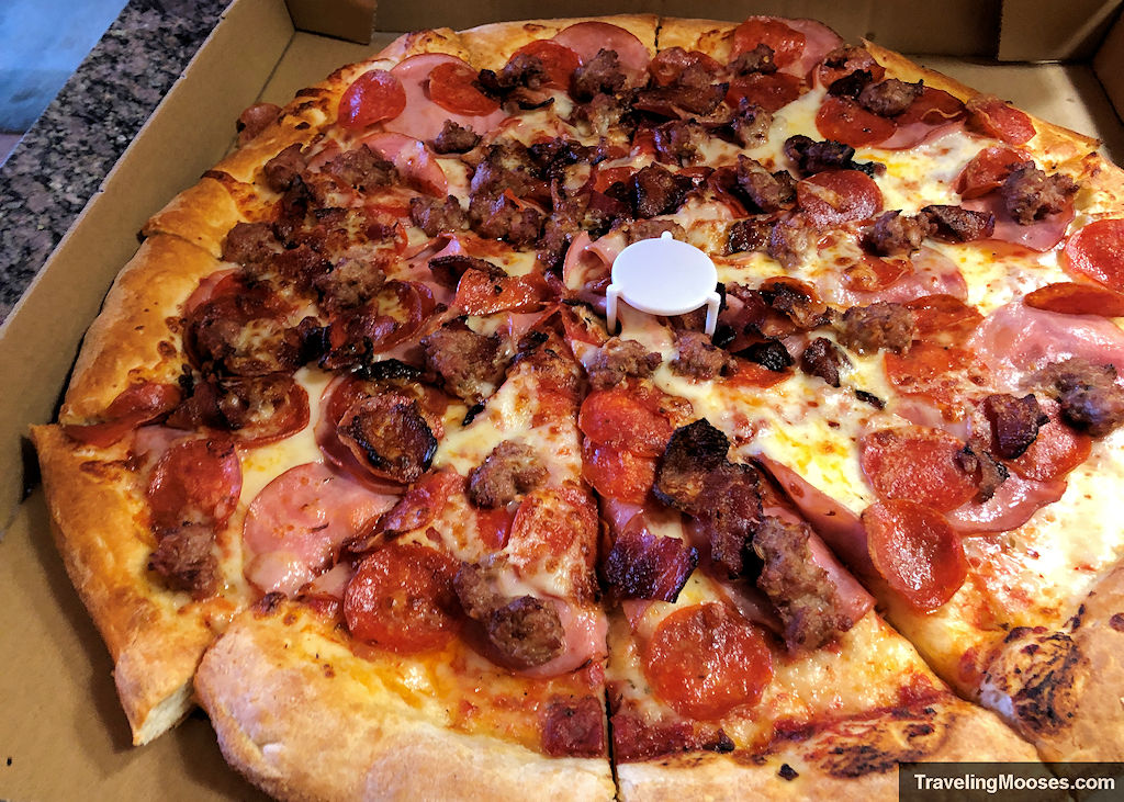 Meat lovers pizza with thick crust