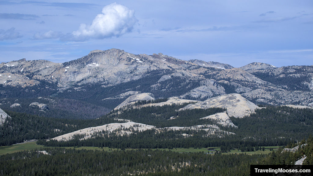 Sweeping views of mountain landscape seen from the summit of Lembert Dome