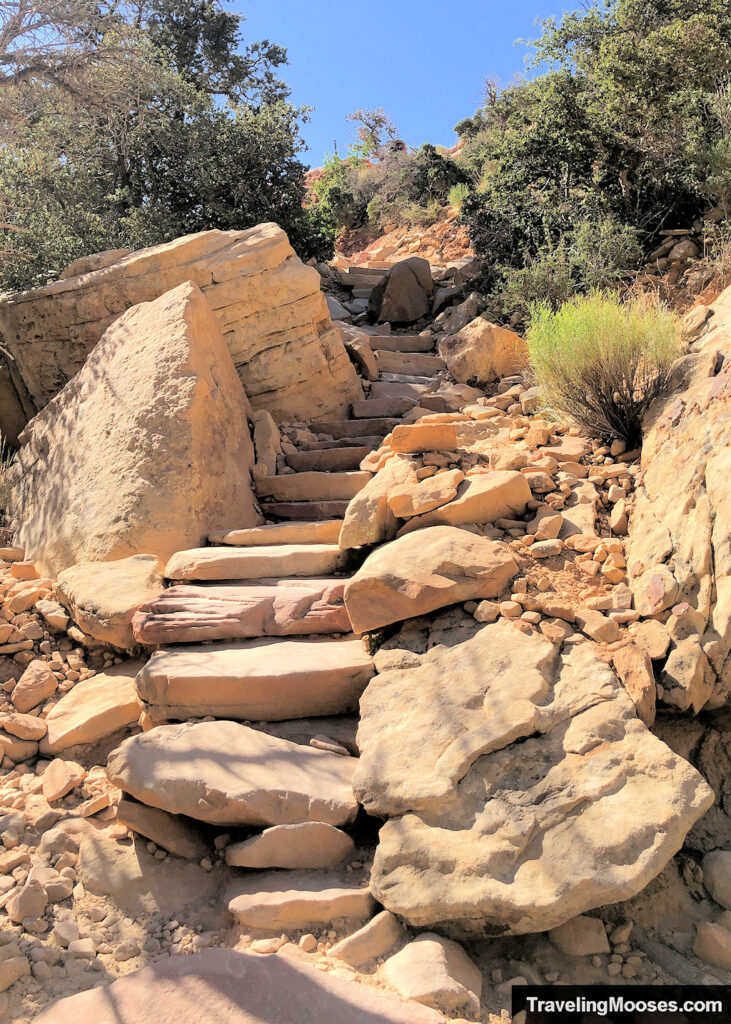Stone staircase weaving up a desert landscape