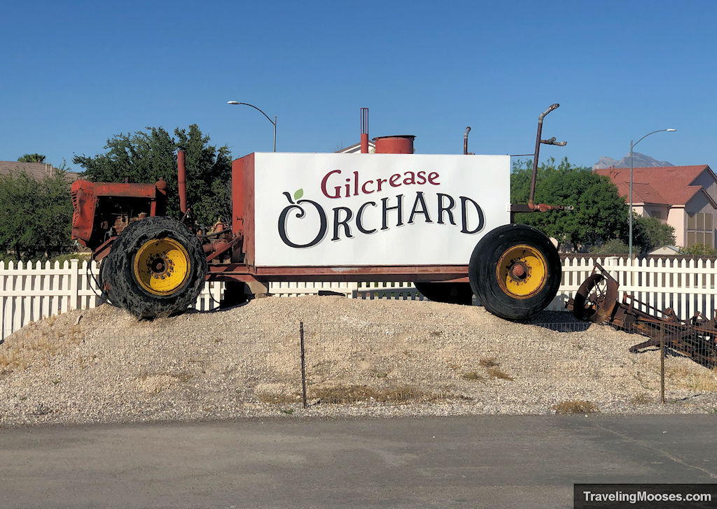 Old traffic with a large white Gilcrease Orchard sign painted on the side