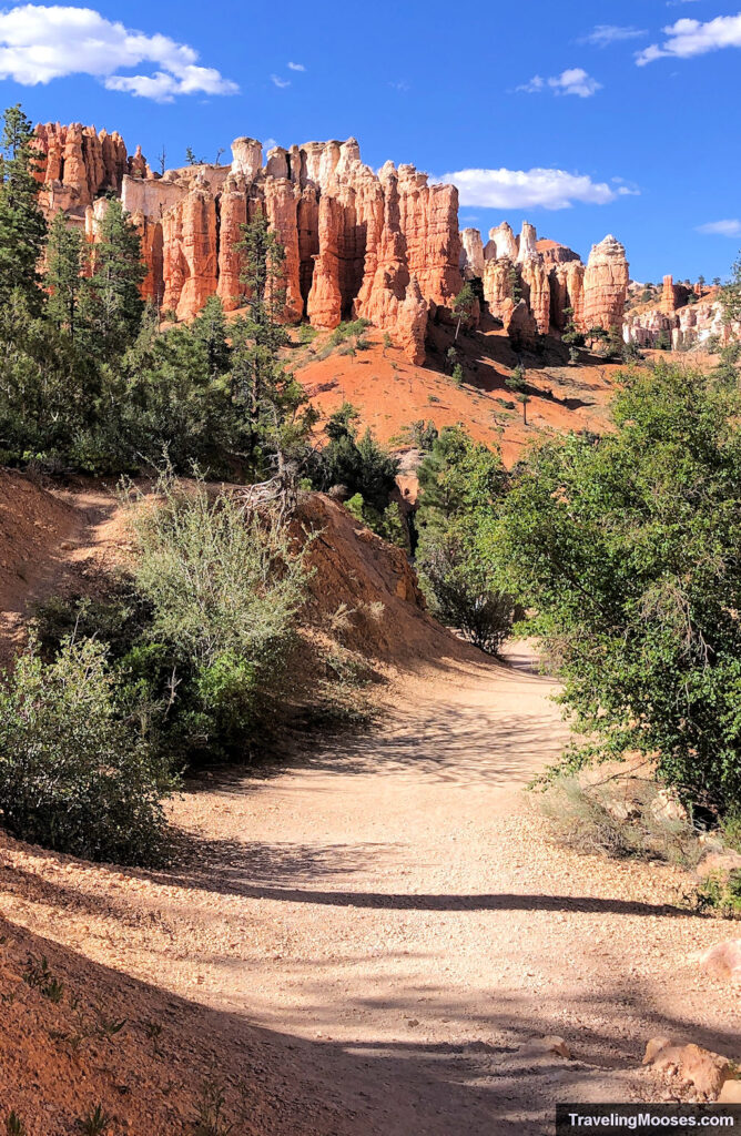 Winding path towards red and white hoodoos