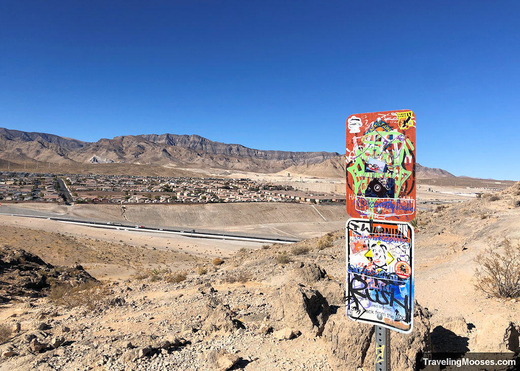 A sign covered in graffiti