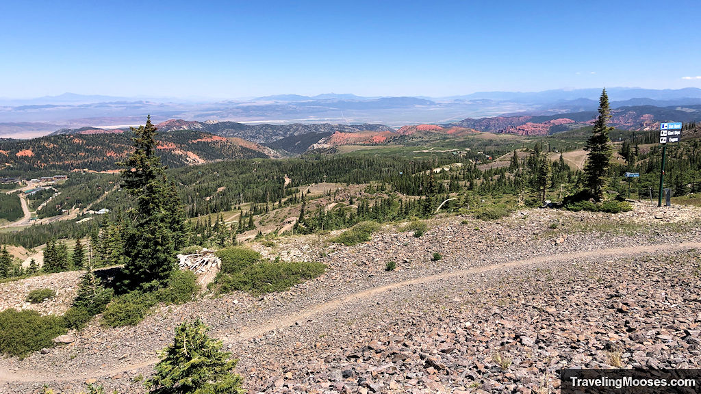Mountain landscape with a mountain bike path in the foreground
