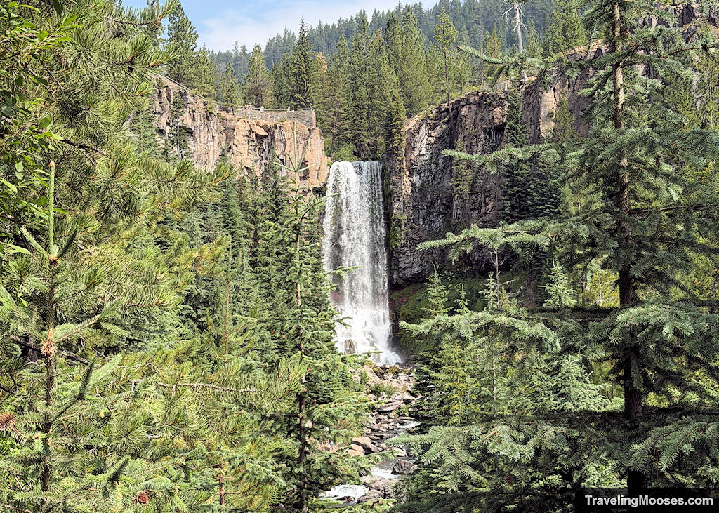 Waterfall cascading over a canyon lookout